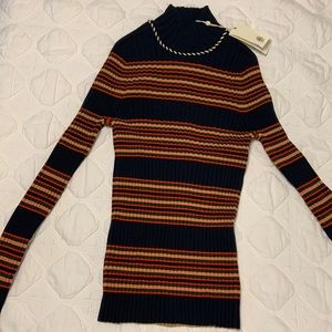 Tory Burch navy striped, ribbed long sleeve shirt.